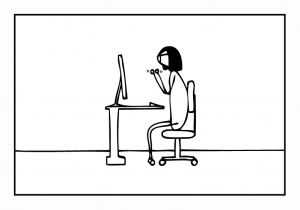 A cartoon image of a cartoonist sits at a small computer desk and shakes her fists