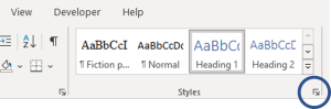 Arrow for expanding the Styles pane from the Styles group under the Home tab in the MS Word ribbon