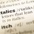 Close-up of a dictionary entry for the word "italics"