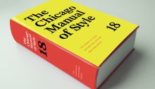 Color image of The Chicago Manual of Style, 18th edition, showing the yellow panel of the front of the dust jacket and the warm red spine.